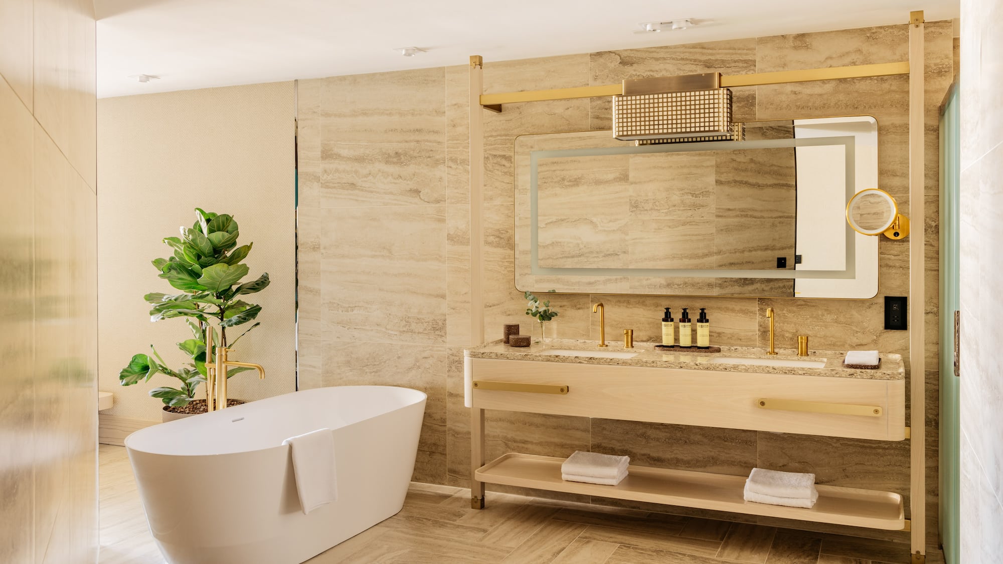a bathroom with a tub and sink