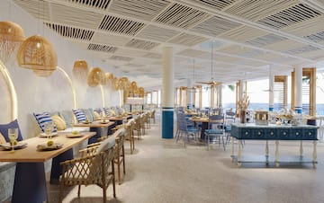 a room with tables and chairs