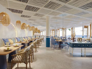 a room with tables and chairs