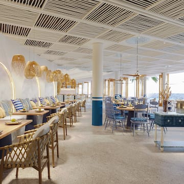 a room with tables and chairs