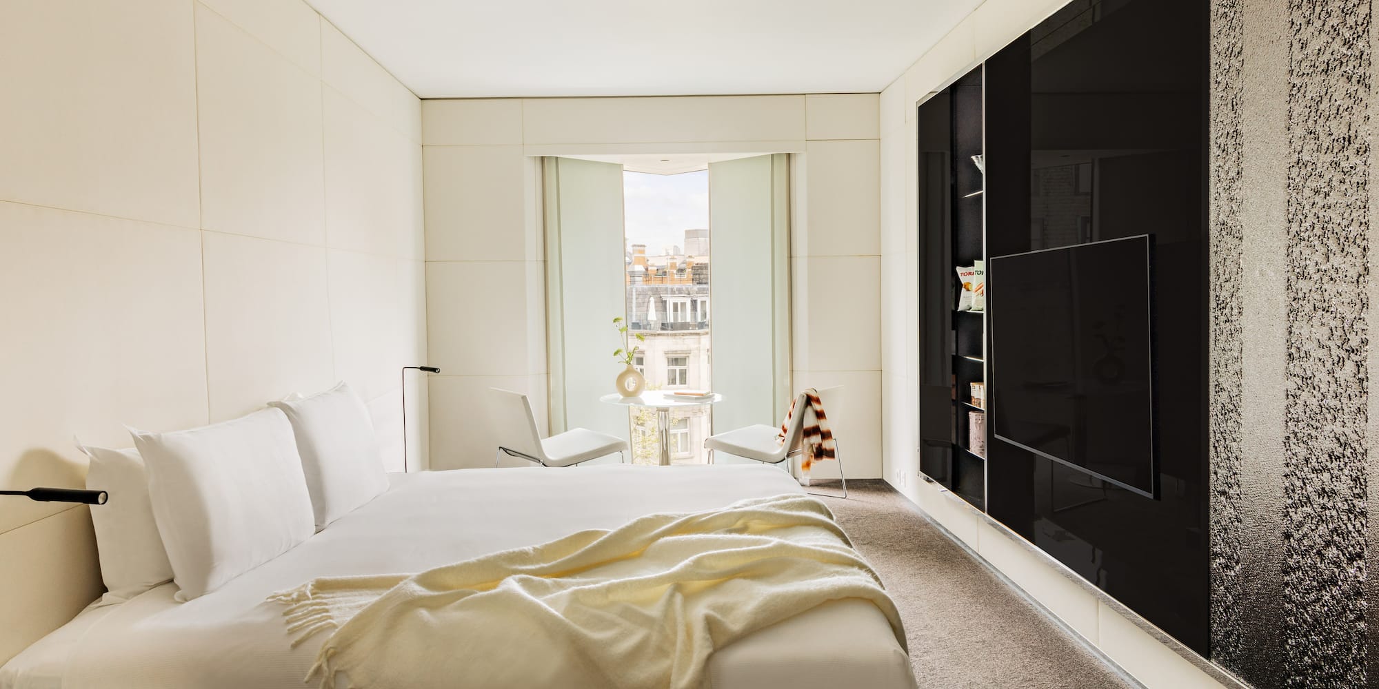 a white bed in a room