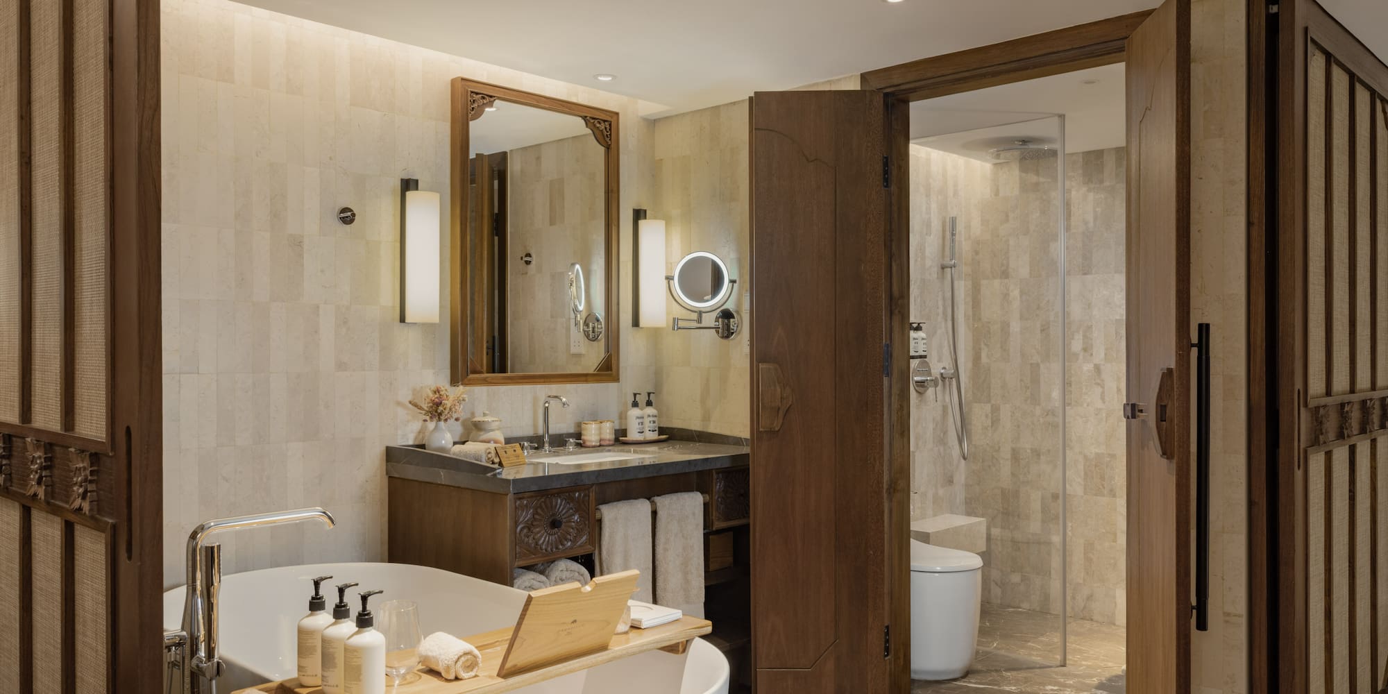 a bathroom with a tub and a shower