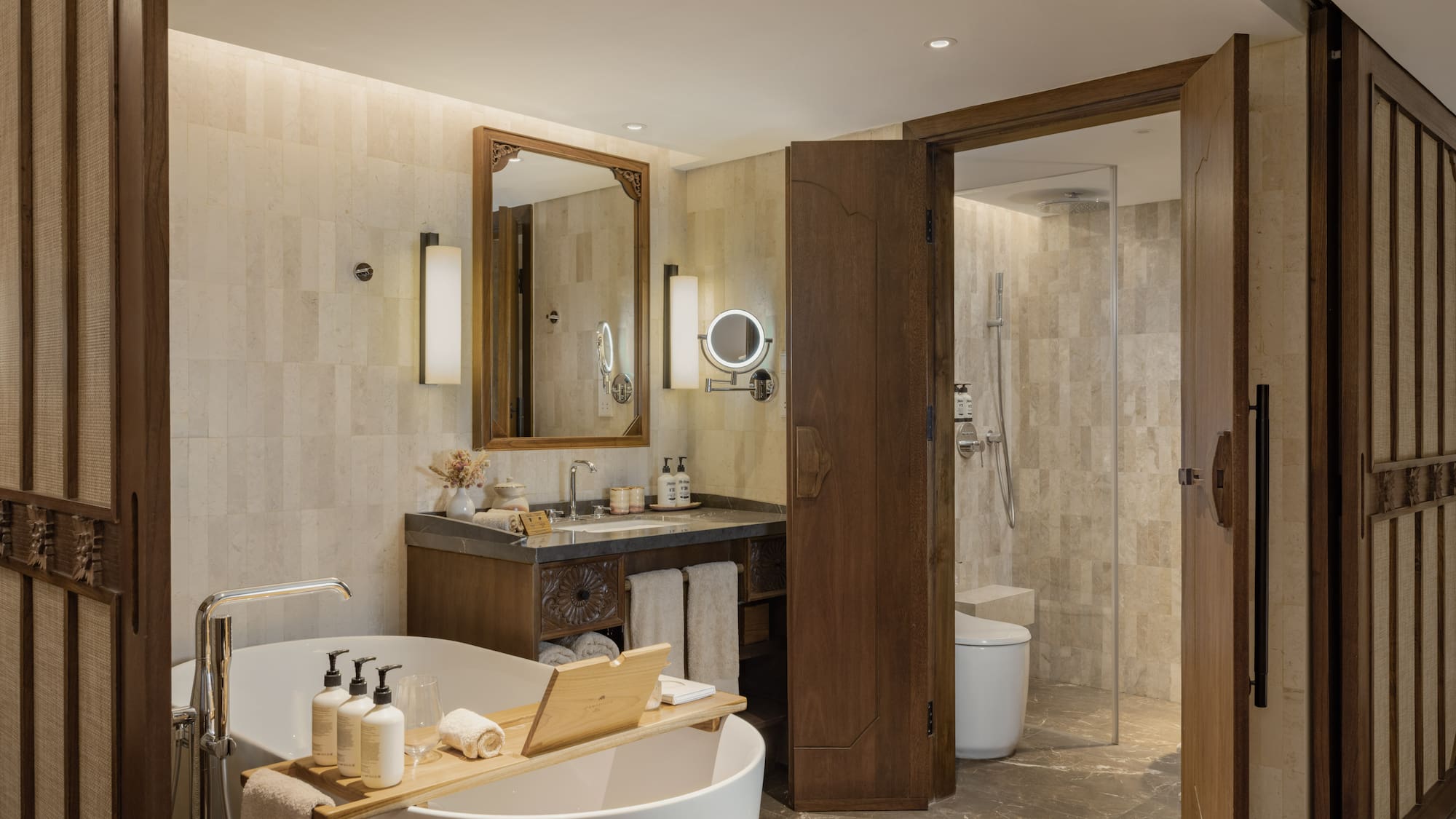 a bathroom with a tub and a shower