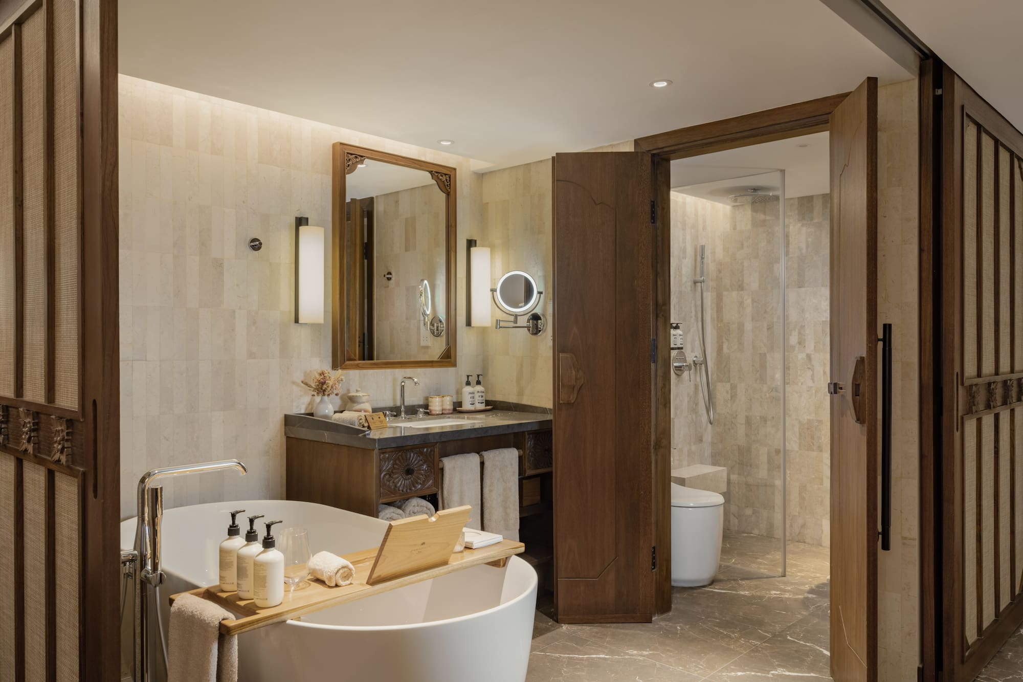 a bathroom with a tub and a shower