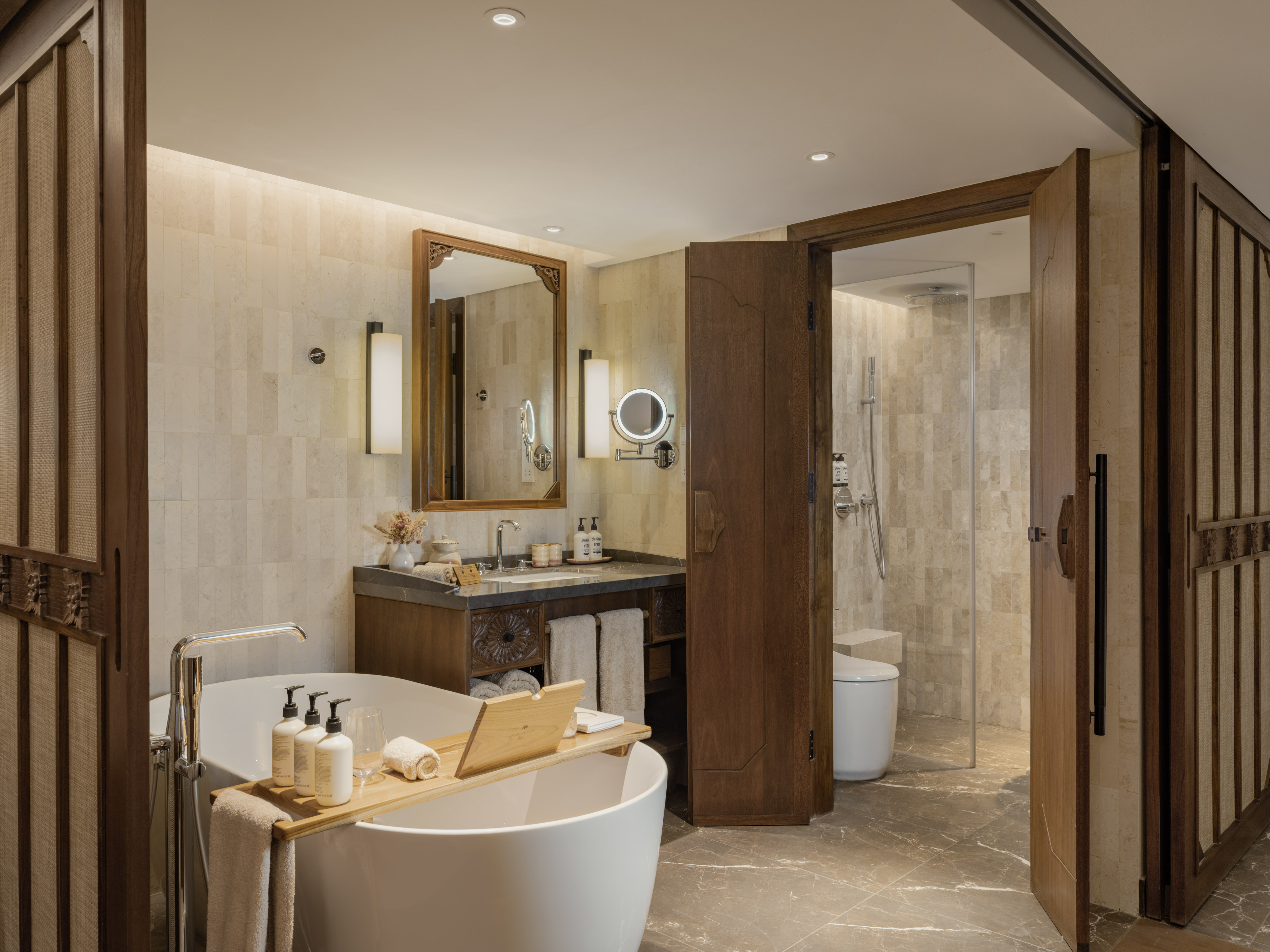 a bathroom with a tub and a shower