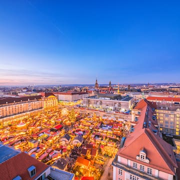 a city with many buildings and a market