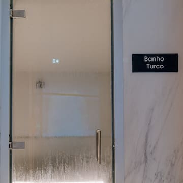 a glass door with a sign on it