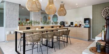 a room with a table and chairs