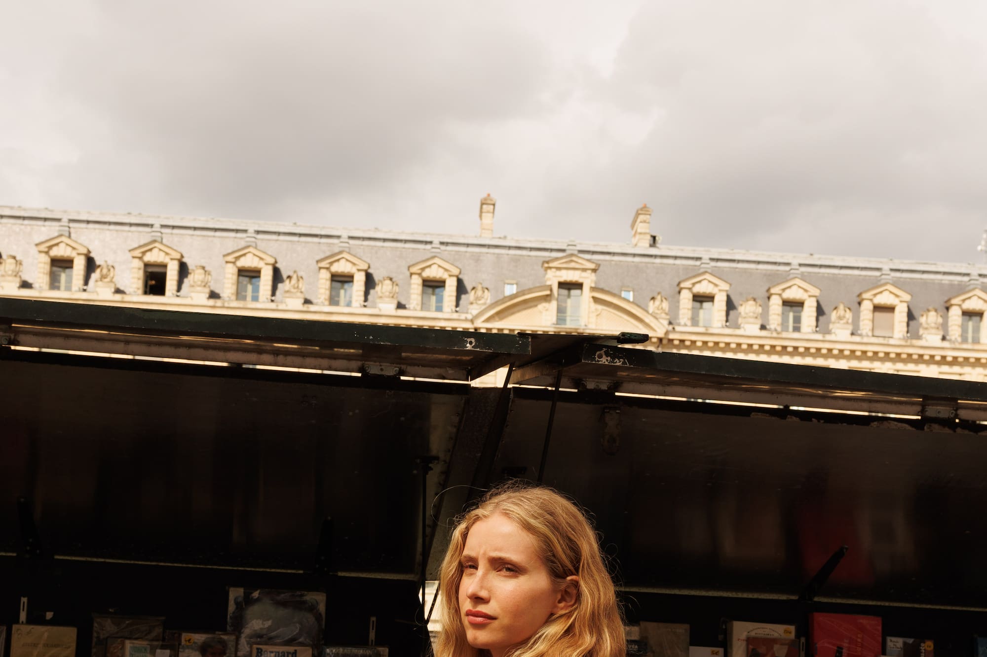 a woman holding a sandwich