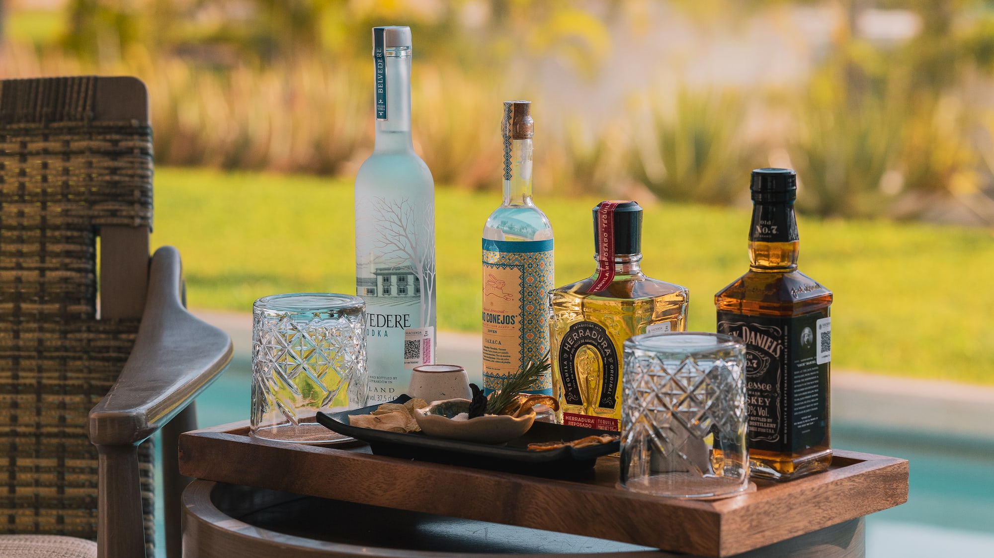 a table with bottles and glasses on it
