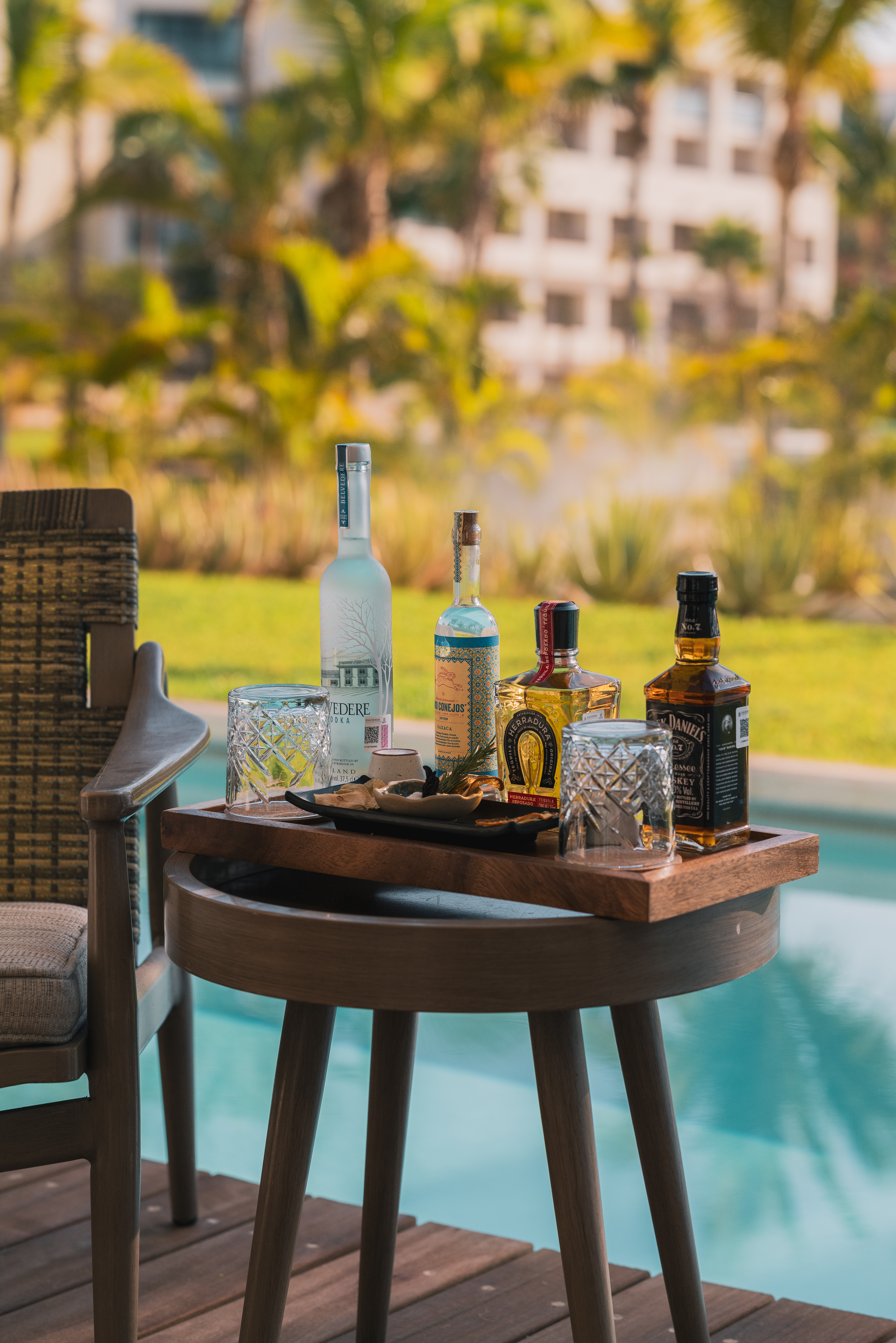 a table with bottles and glasses on it