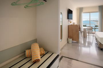 a room with a television and a bed