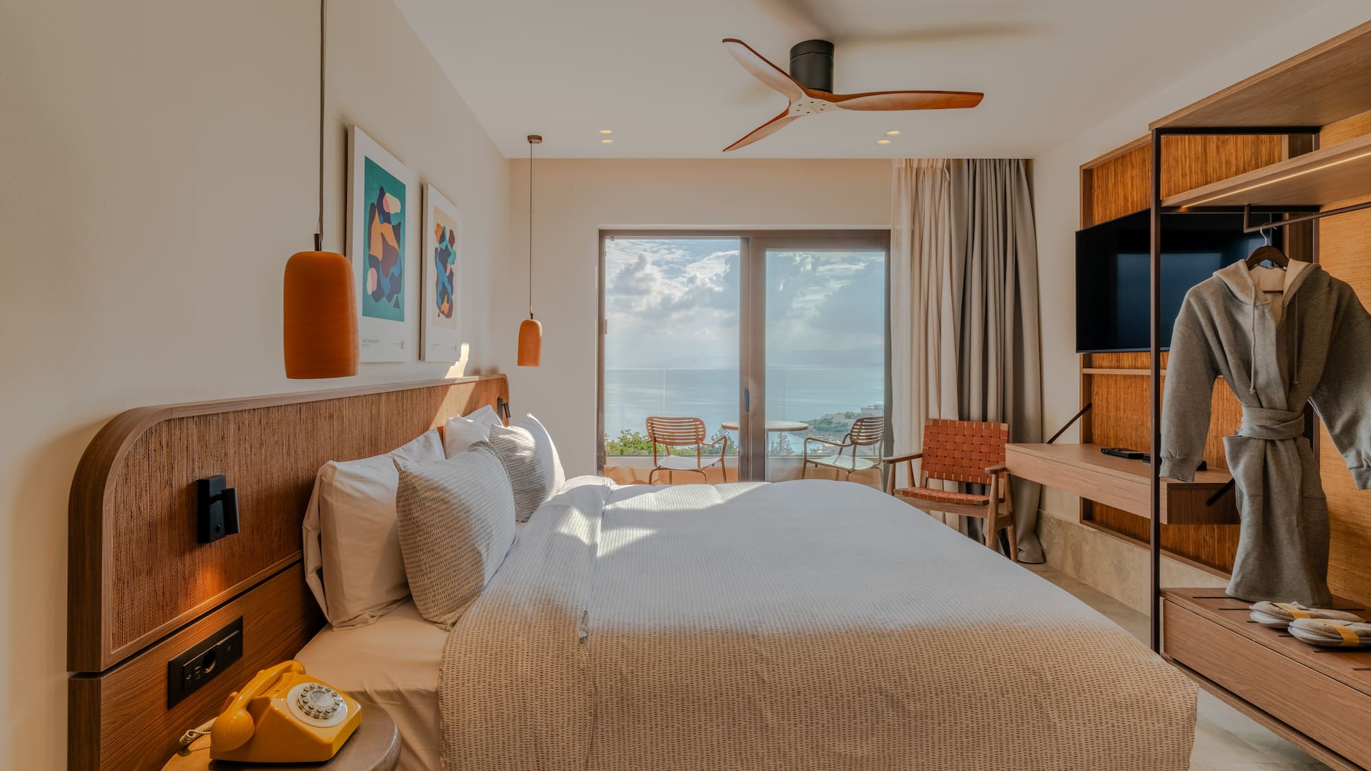 a bedroom with a television and a bed