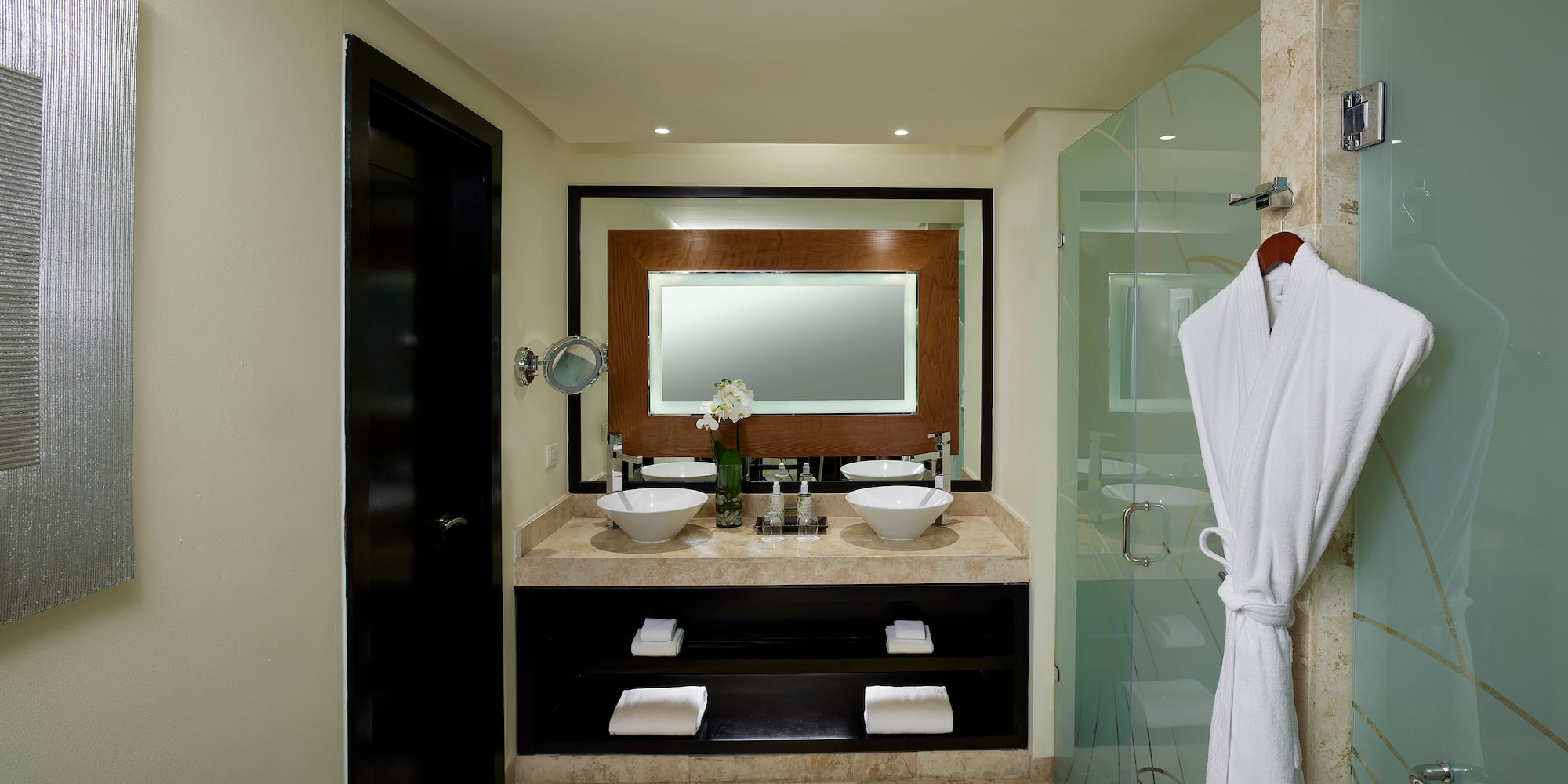 a bathroom with a mirror and sink