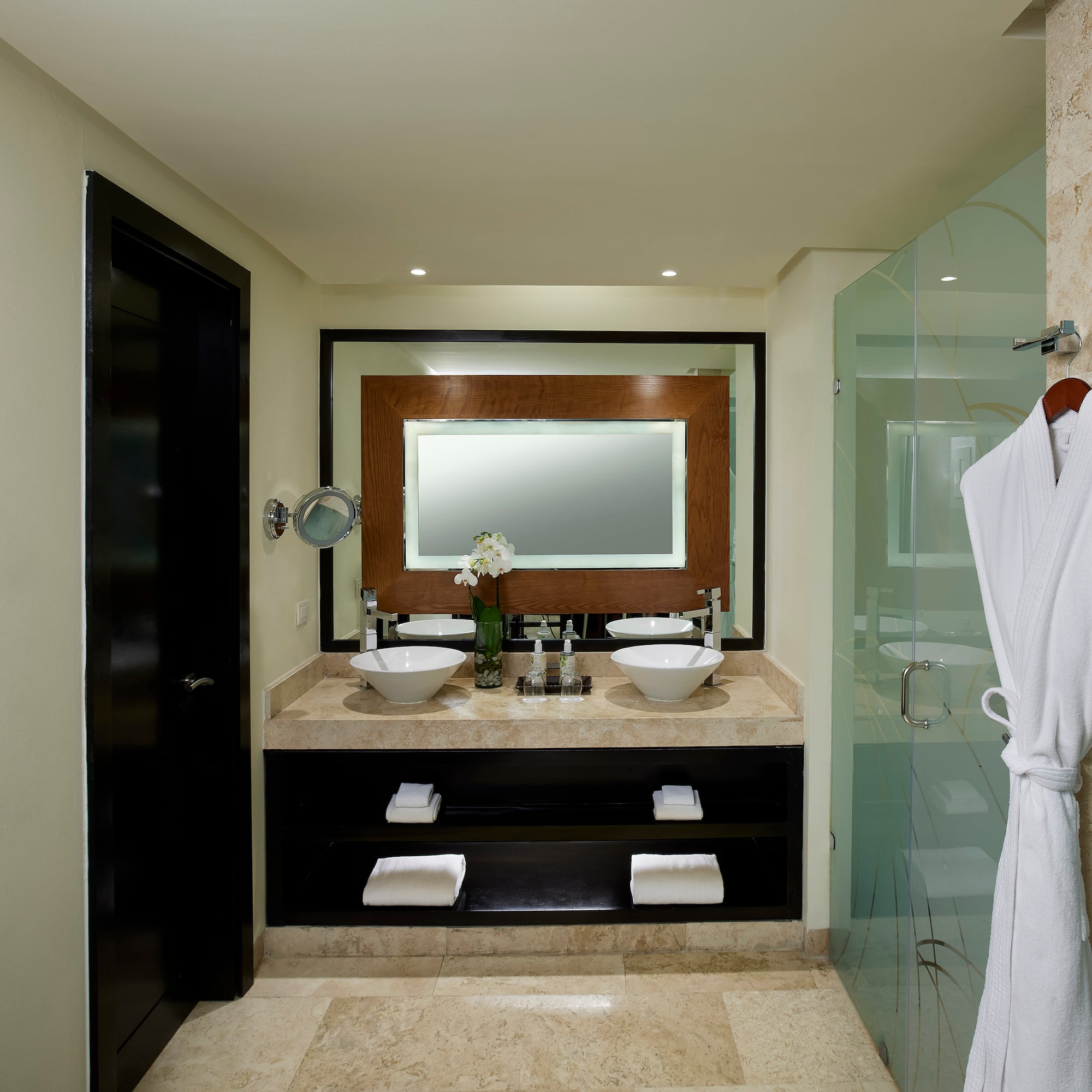 a bathroom with a mirror and sink