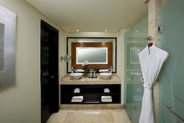 a bathroom with a mirror and sink