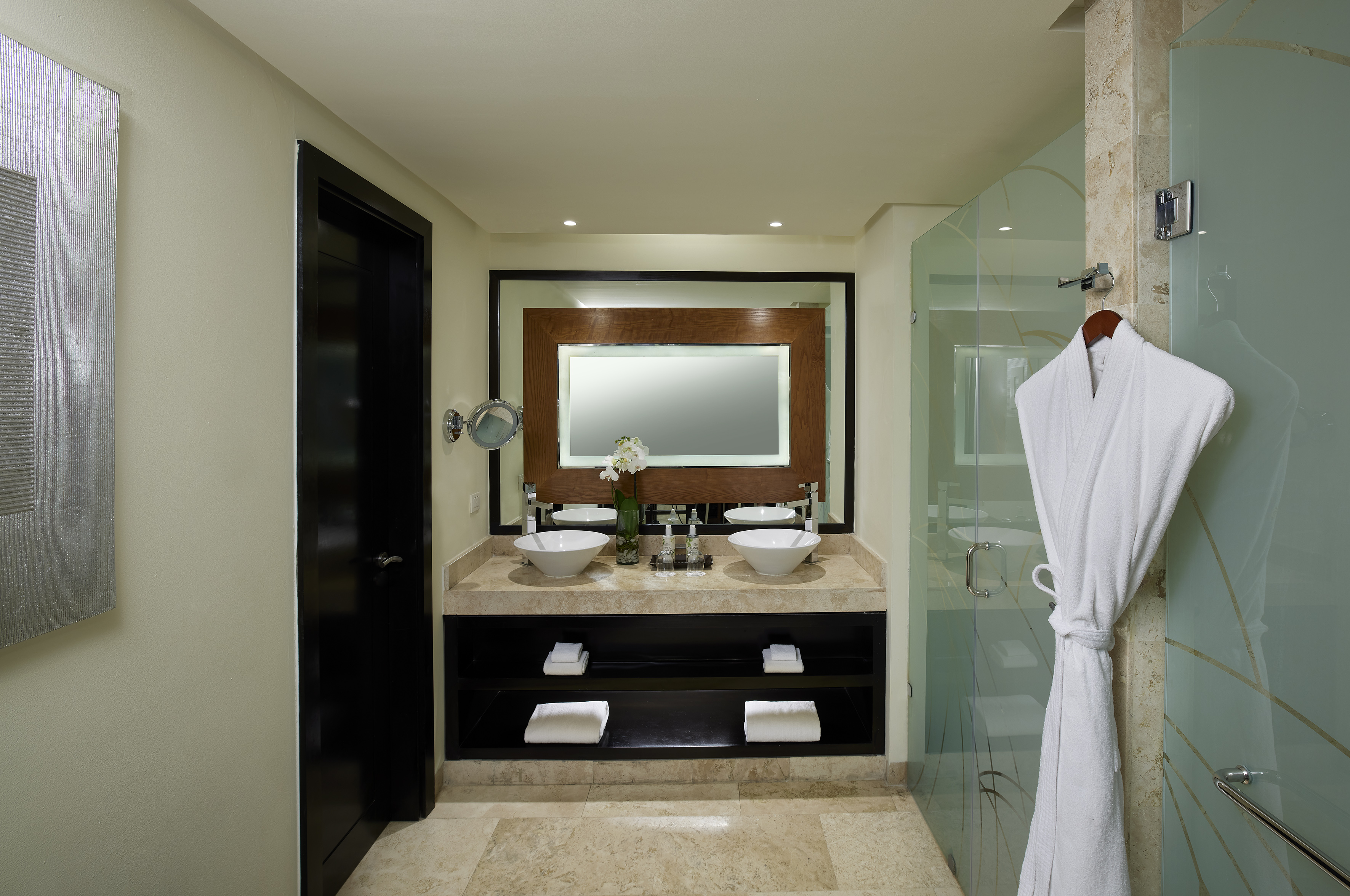 a bathroom with a mirror and sink