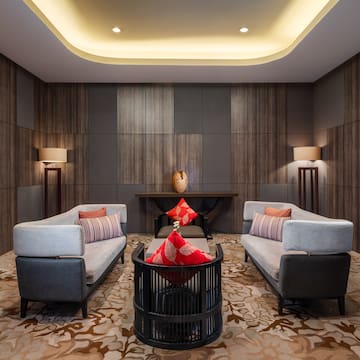 a room with couches and a table