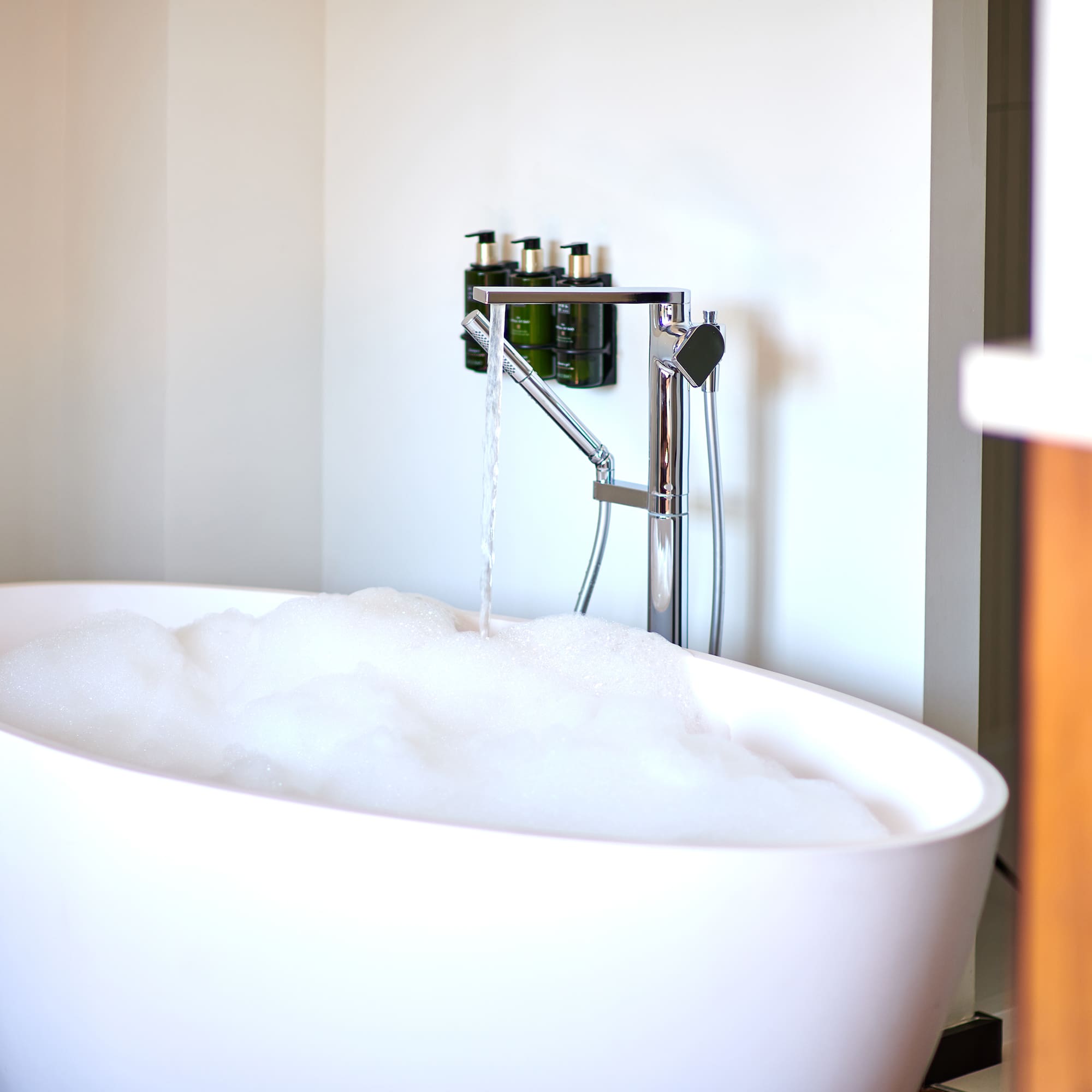 a bathtub with bubbles in it