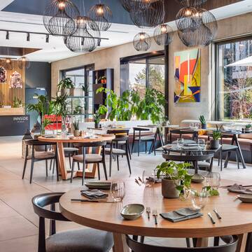 a restaurant with tables and chairs