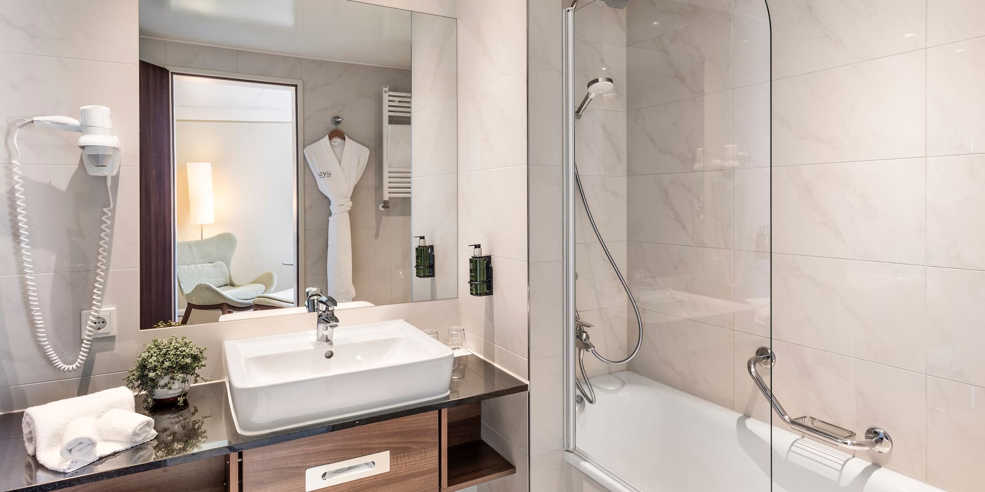 a bathroom with a sink and a bathtub