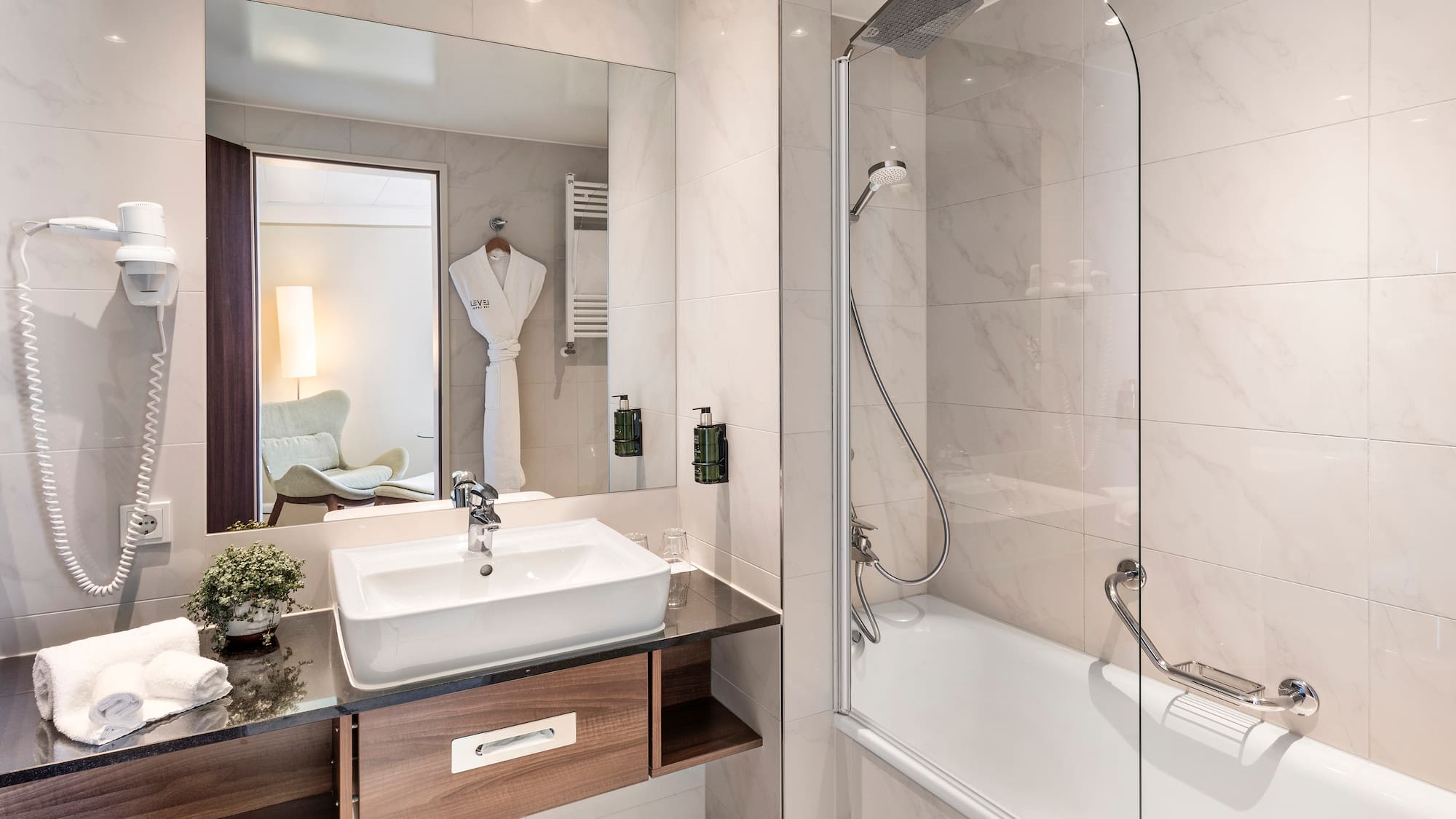 a bathroom with a sink and a bathtub