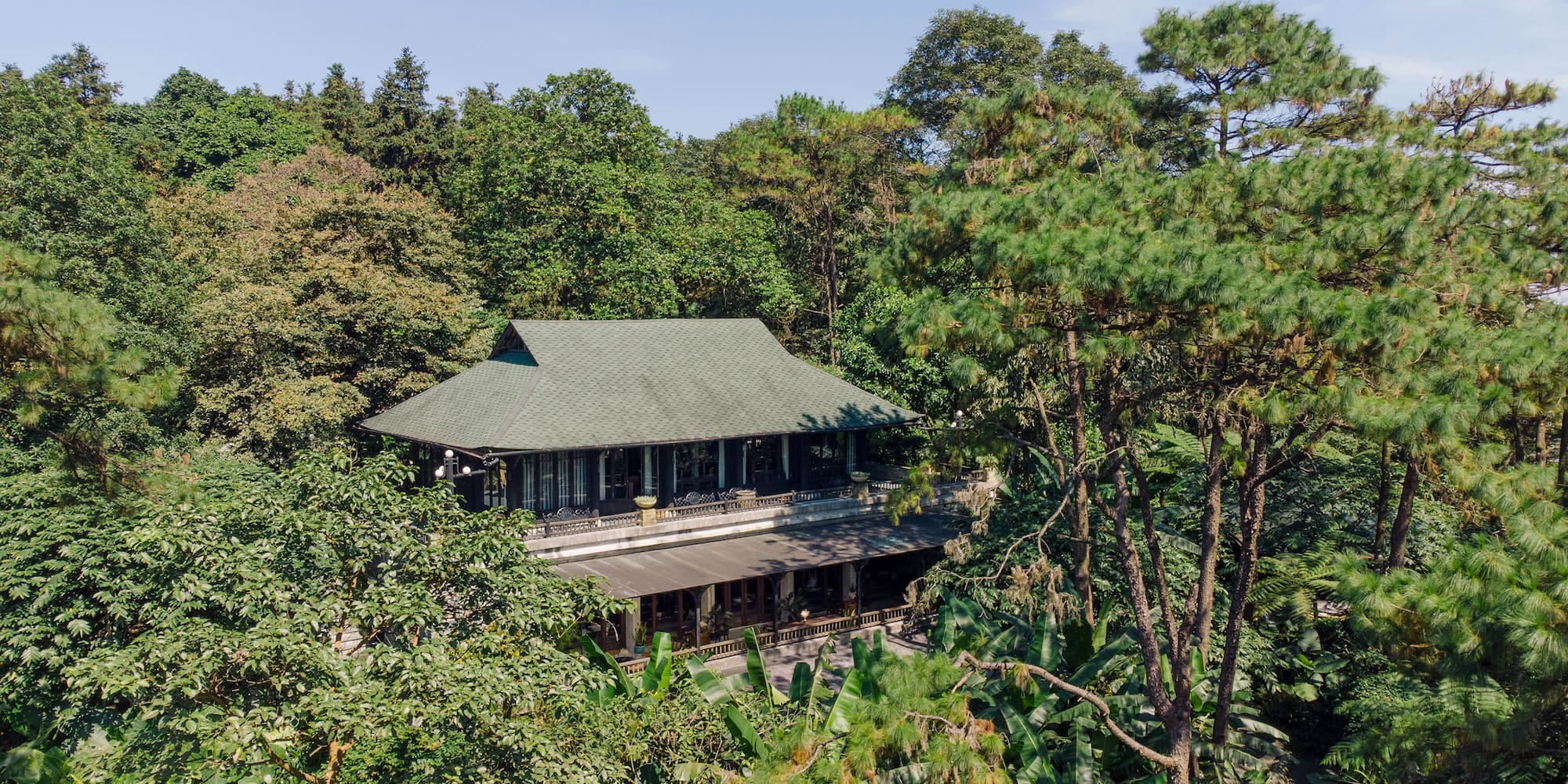 a building surrounded by trees