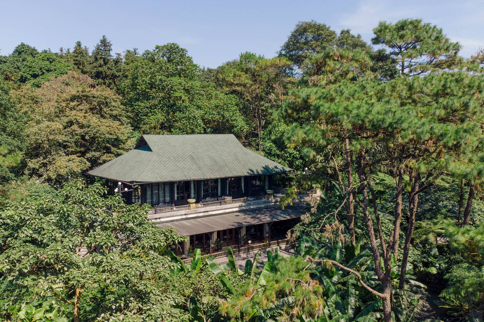 a building surrounded by trees