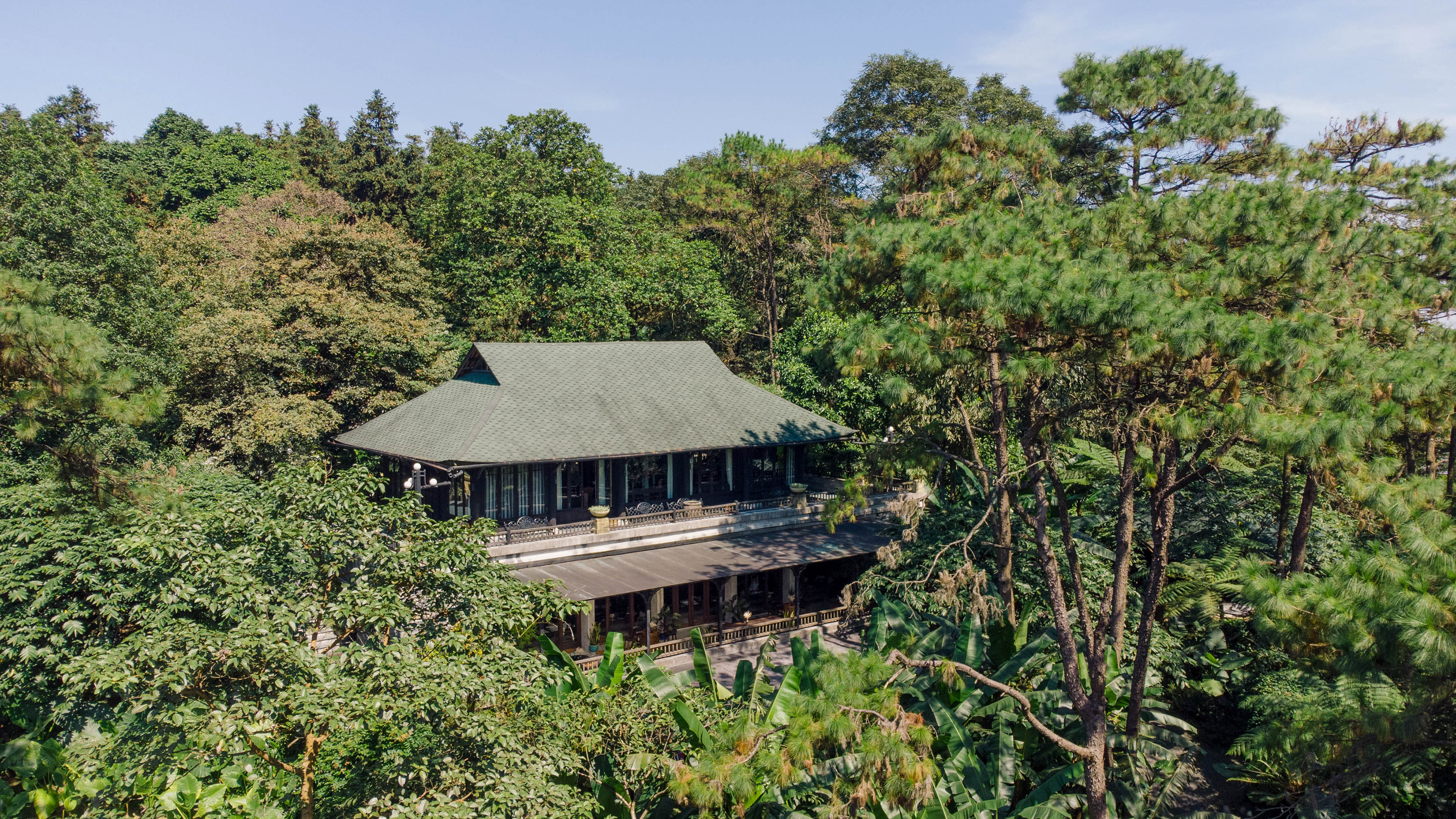 a building surrounded by trees