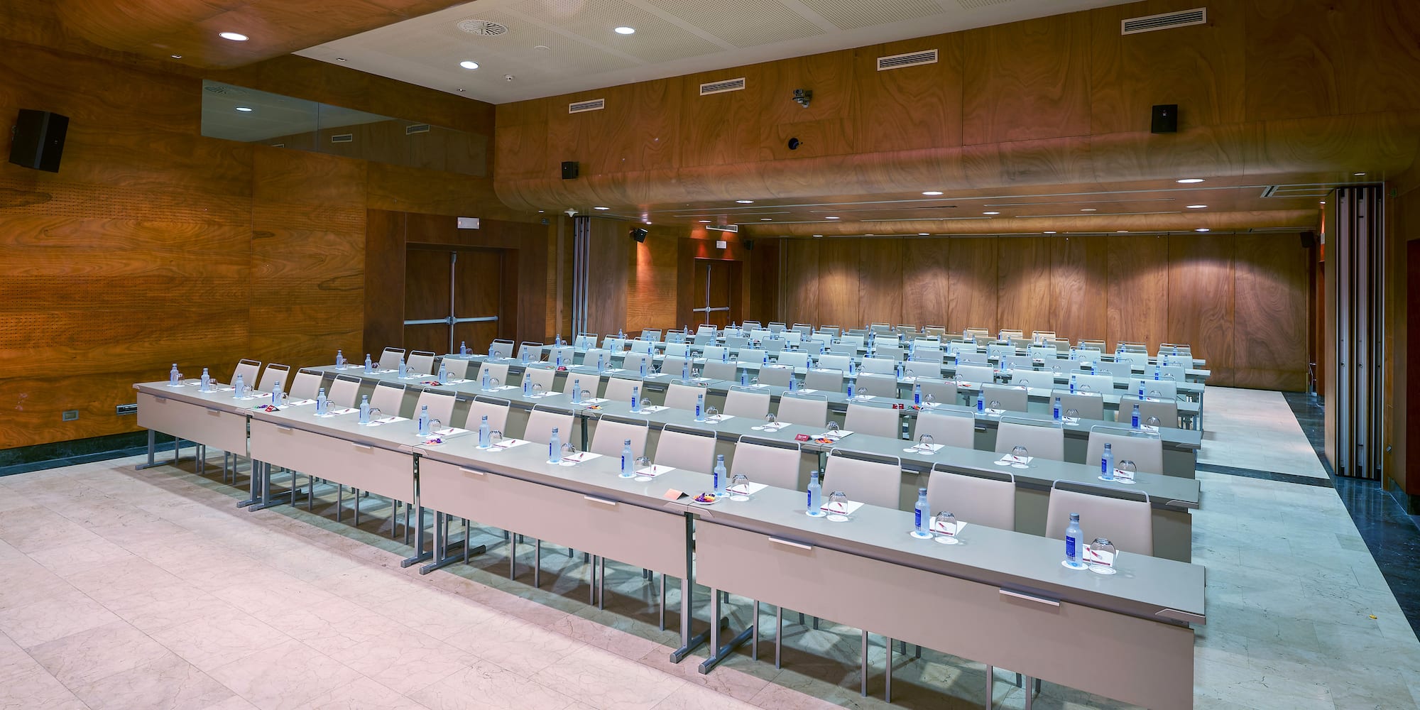 a room with tables and chairs
