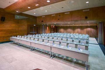 a room with tables and chairs