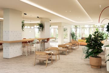 a room with tables and chairs