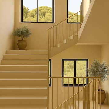 a staircase with plants in a room