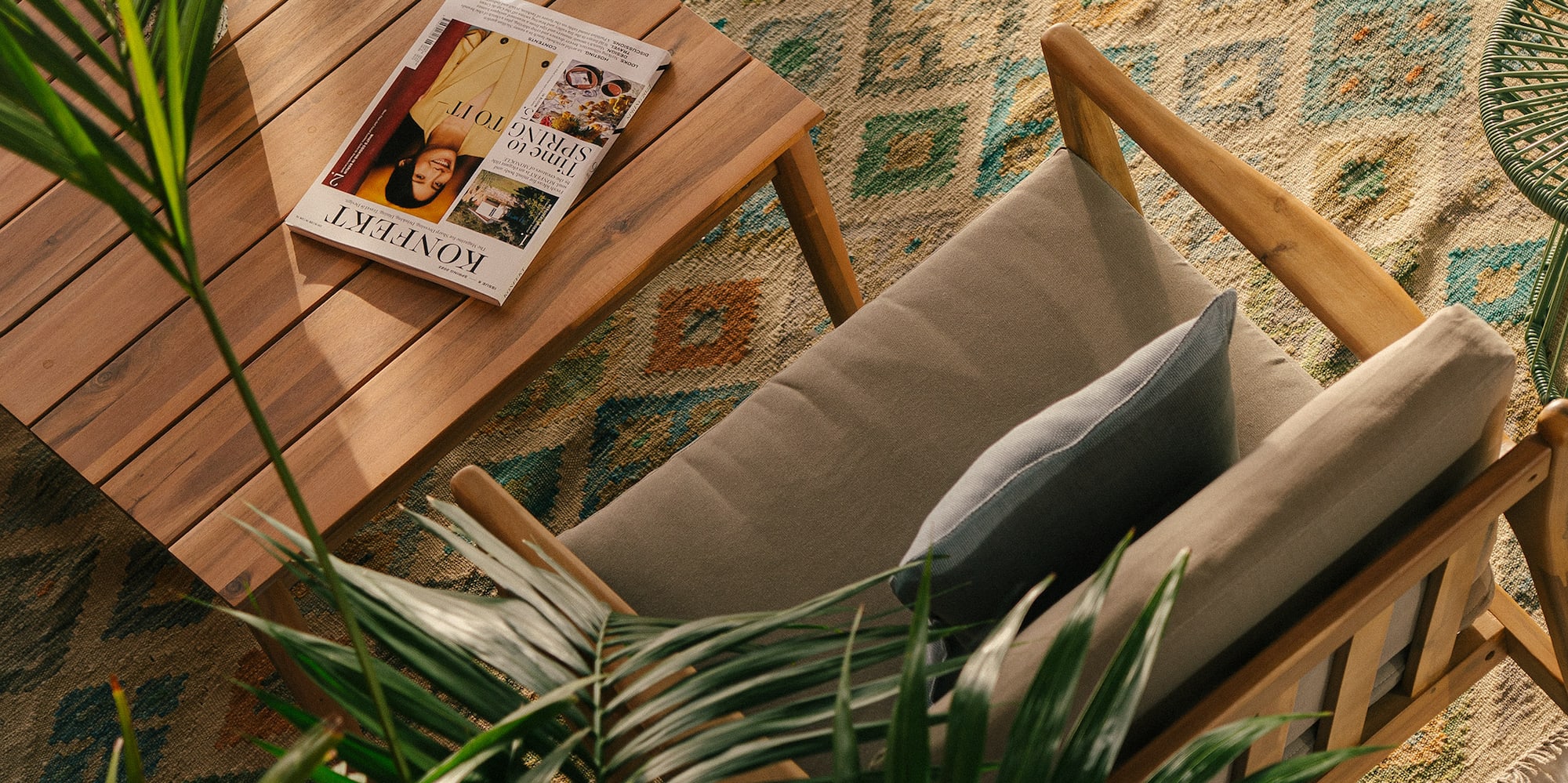a chair and table with a book on it
