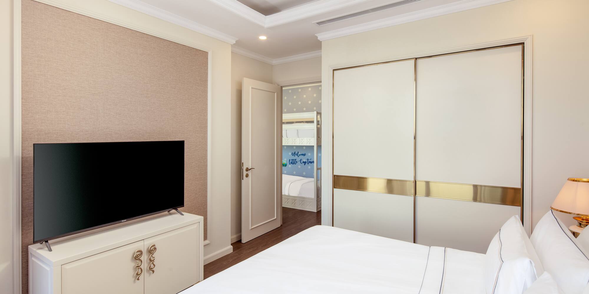 a room with a tv and closet