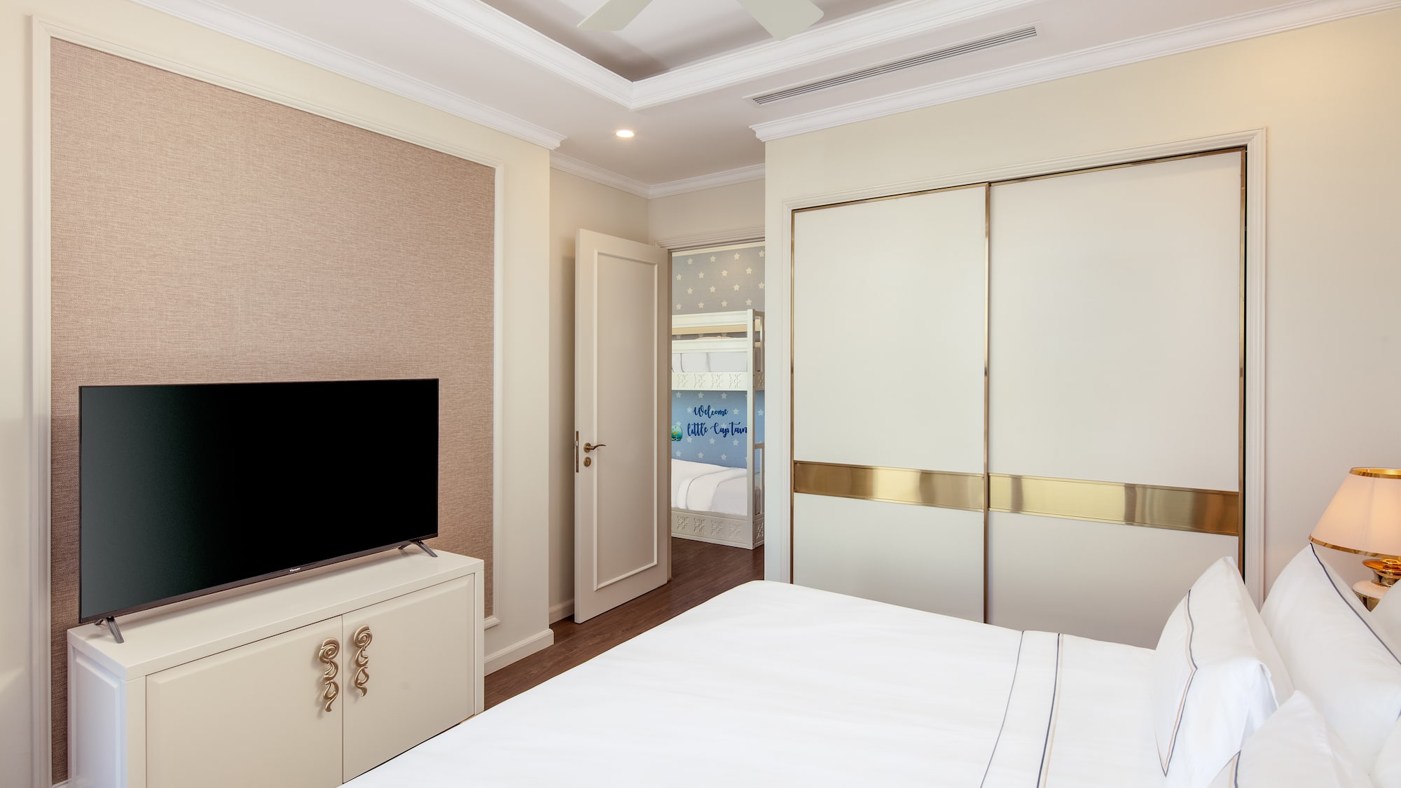 a room with a tv and closet