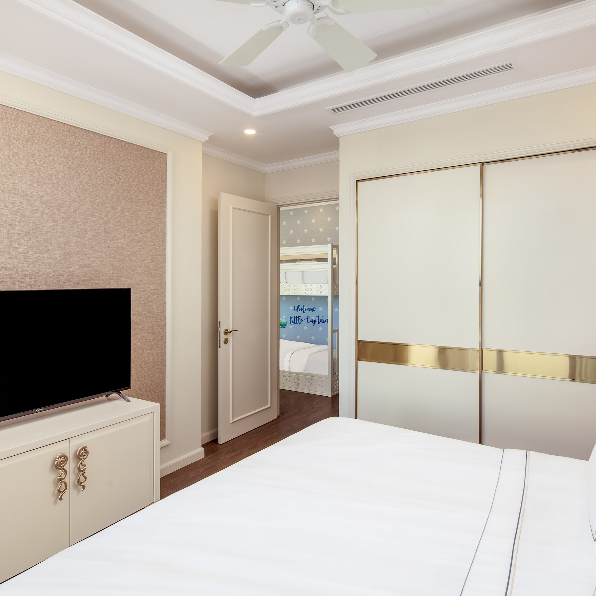 a room with a tv and closet