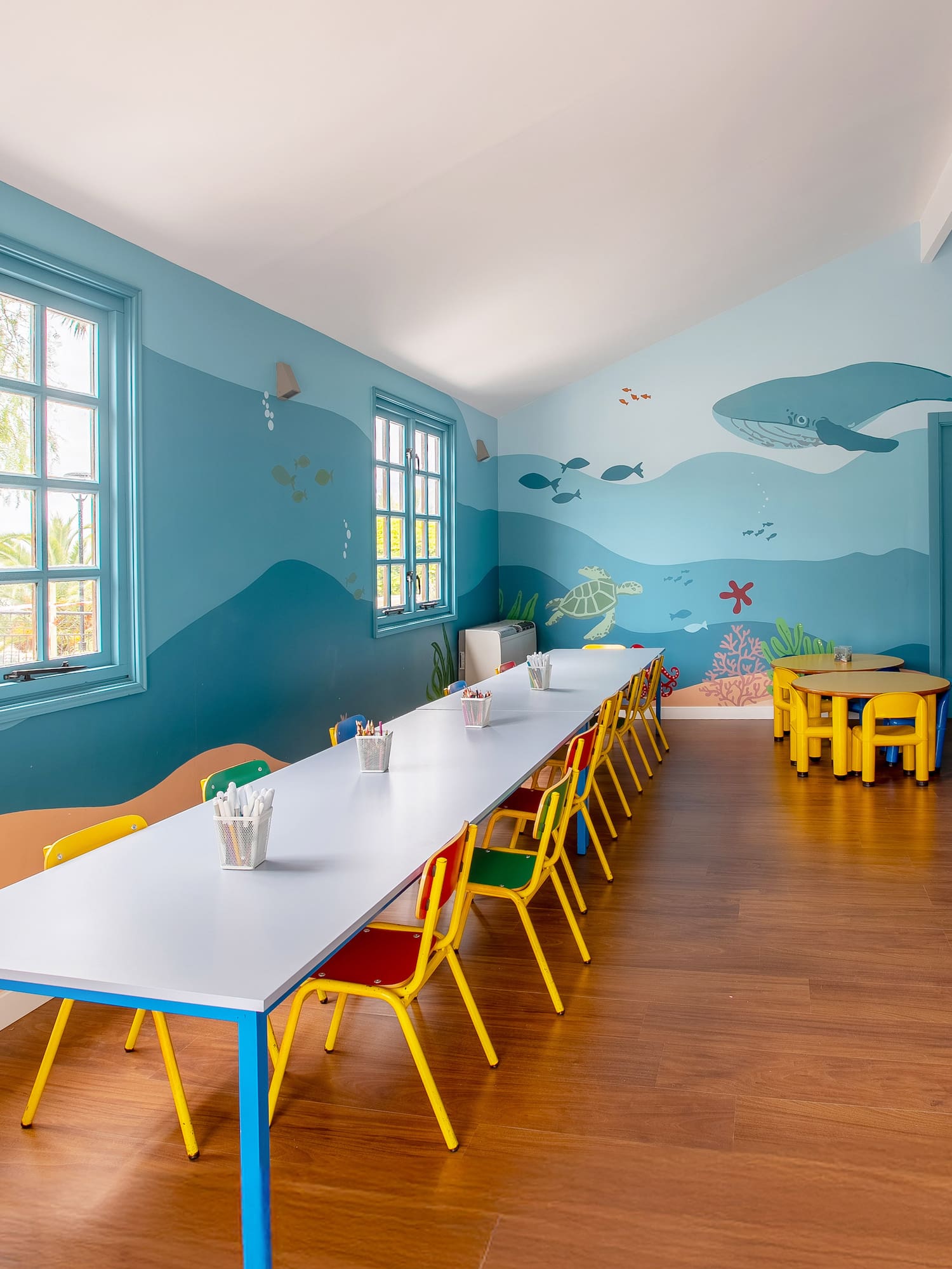 a room with a table and chairs