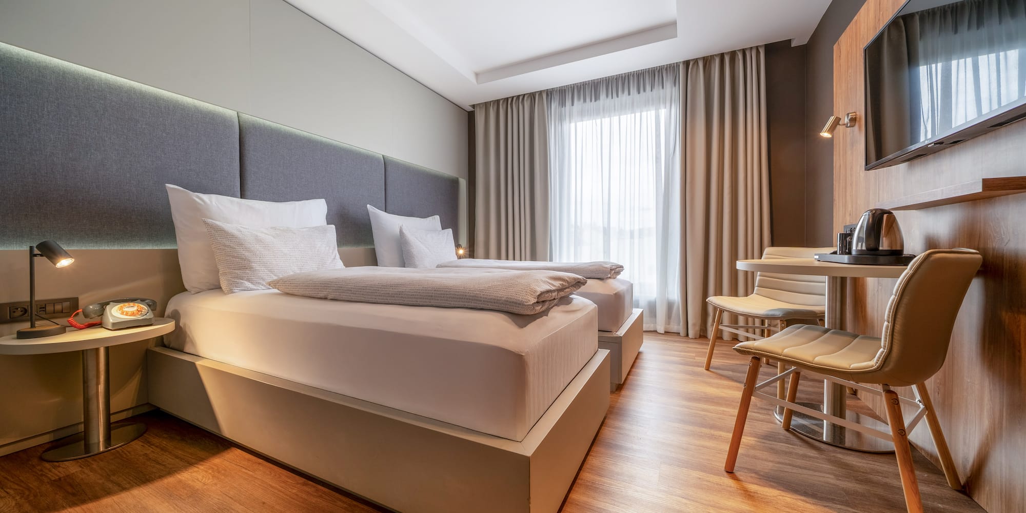 a room with a bed and a table