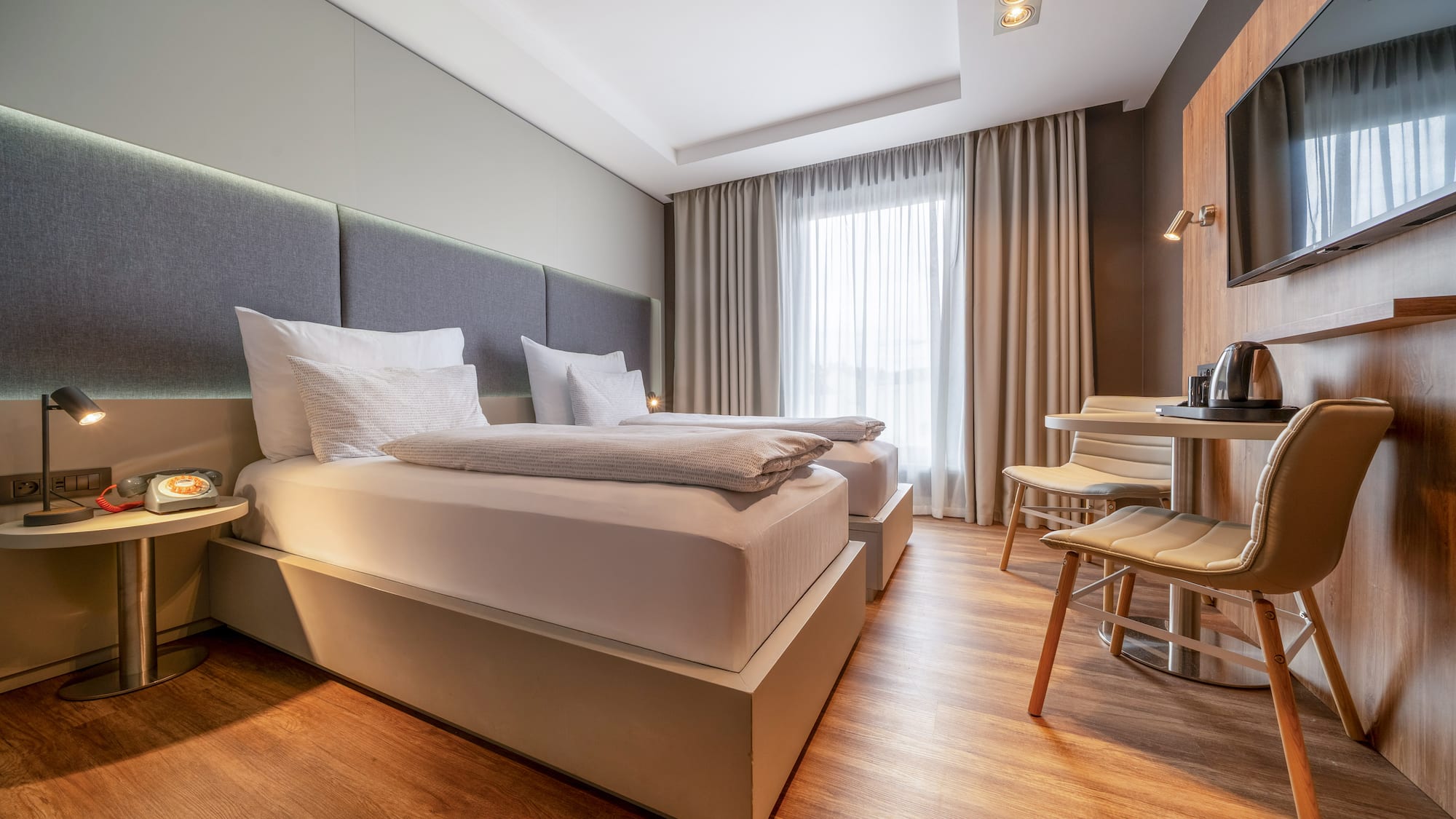 a room with a bed and a table