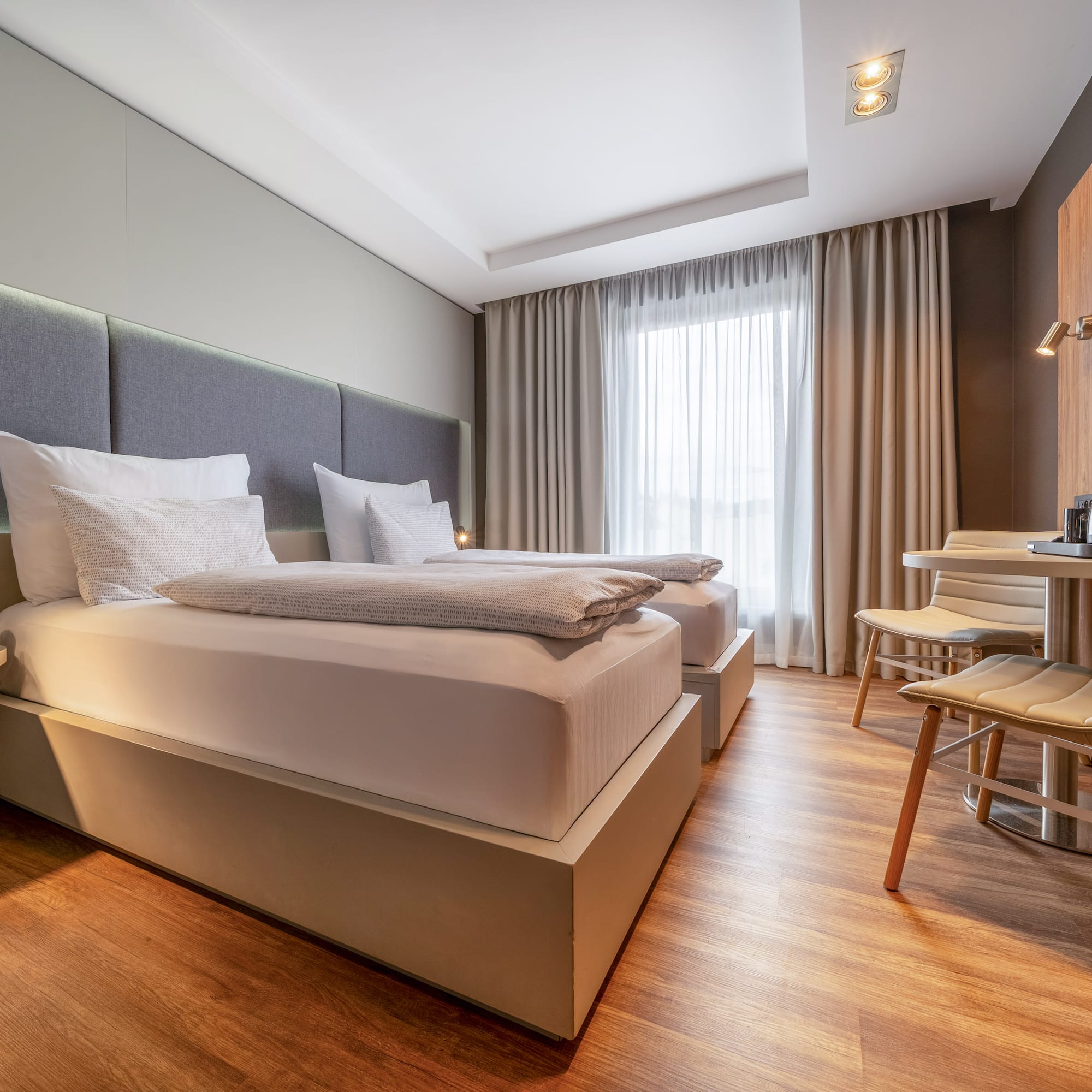 a room with a bed and a table