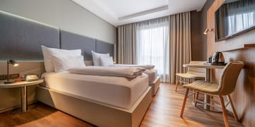 a room with a bed and a table