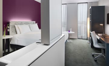 a room with a bed and a table
