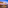 Sunset rooftop bar with DJ, diners, ocean view, and retractable canopy.