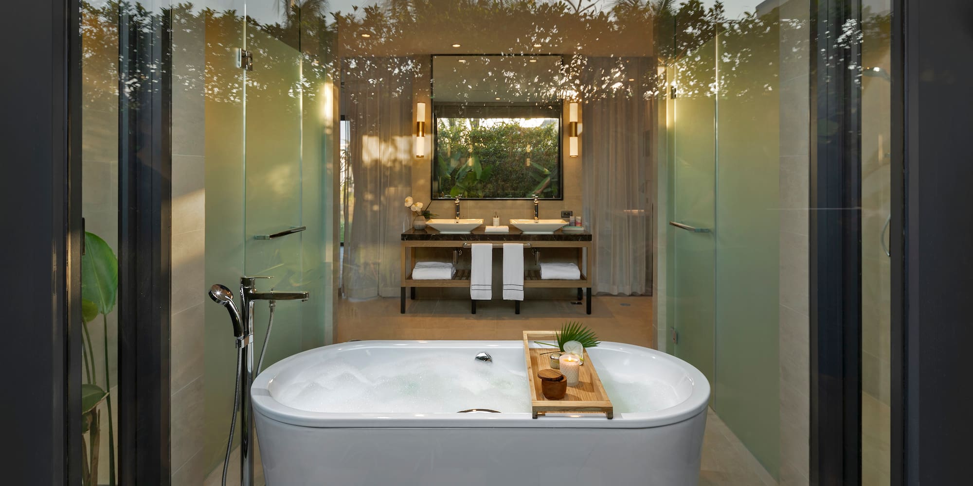 a bathroom with a tub and a mirror