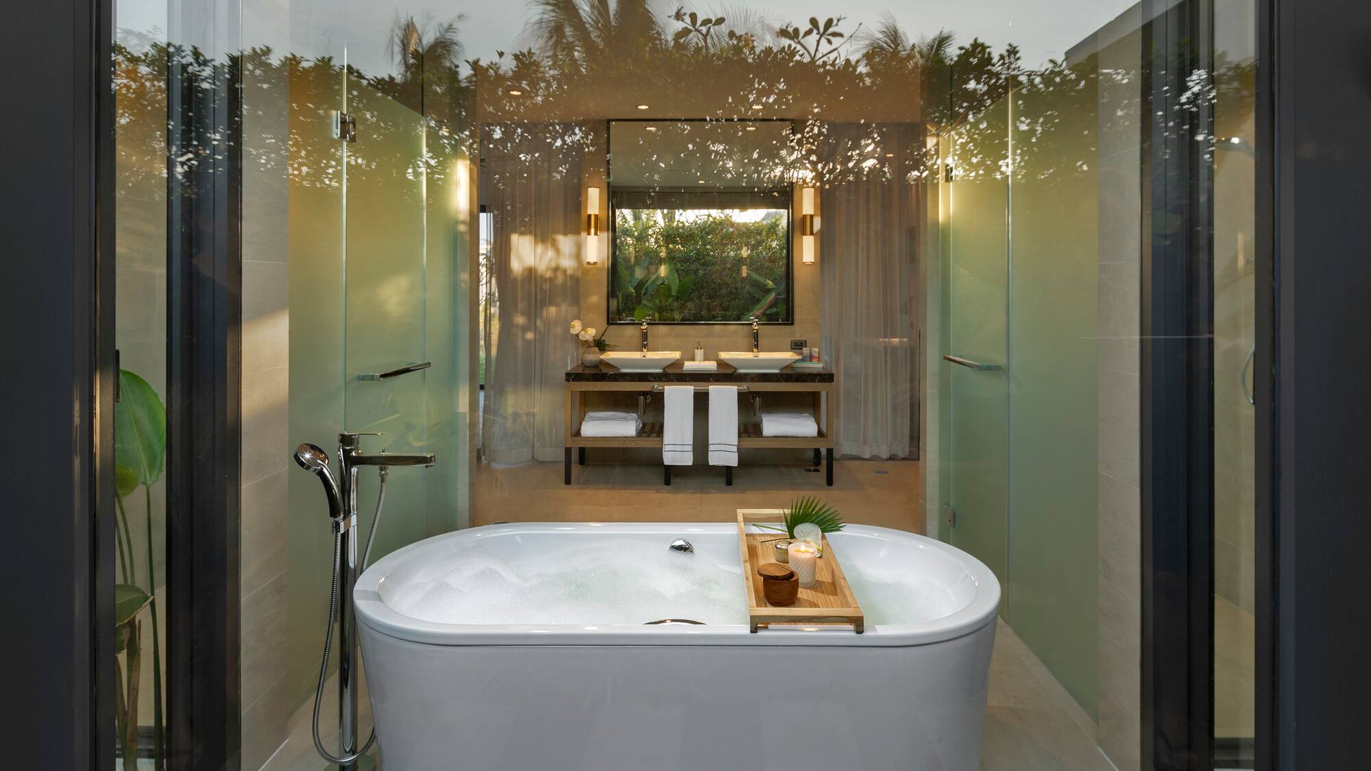 a bathroom with a tub and a mirror