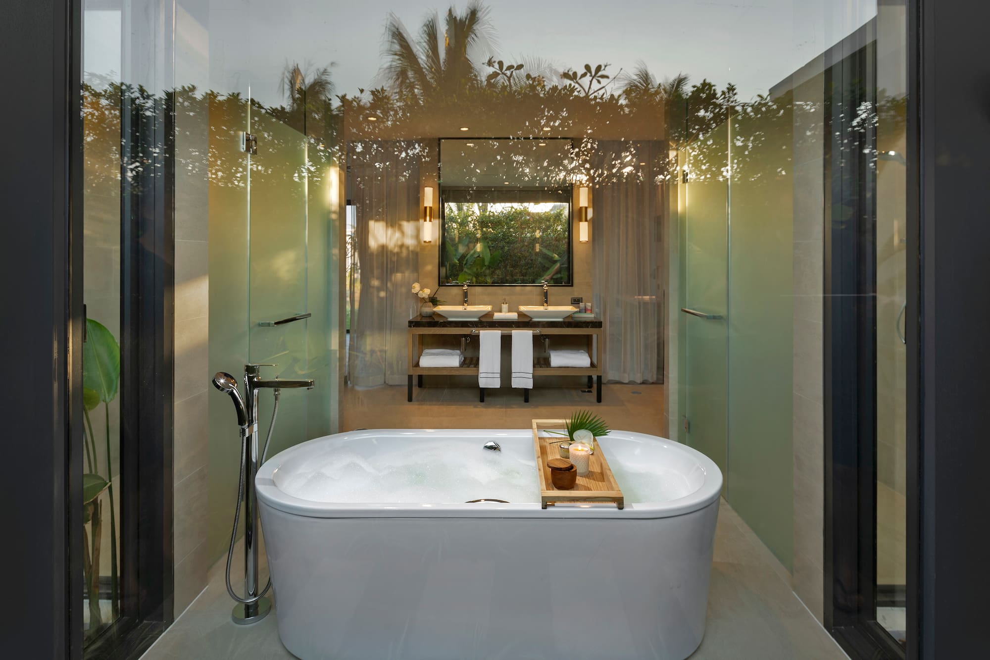a bathroom with a tub and a mirror