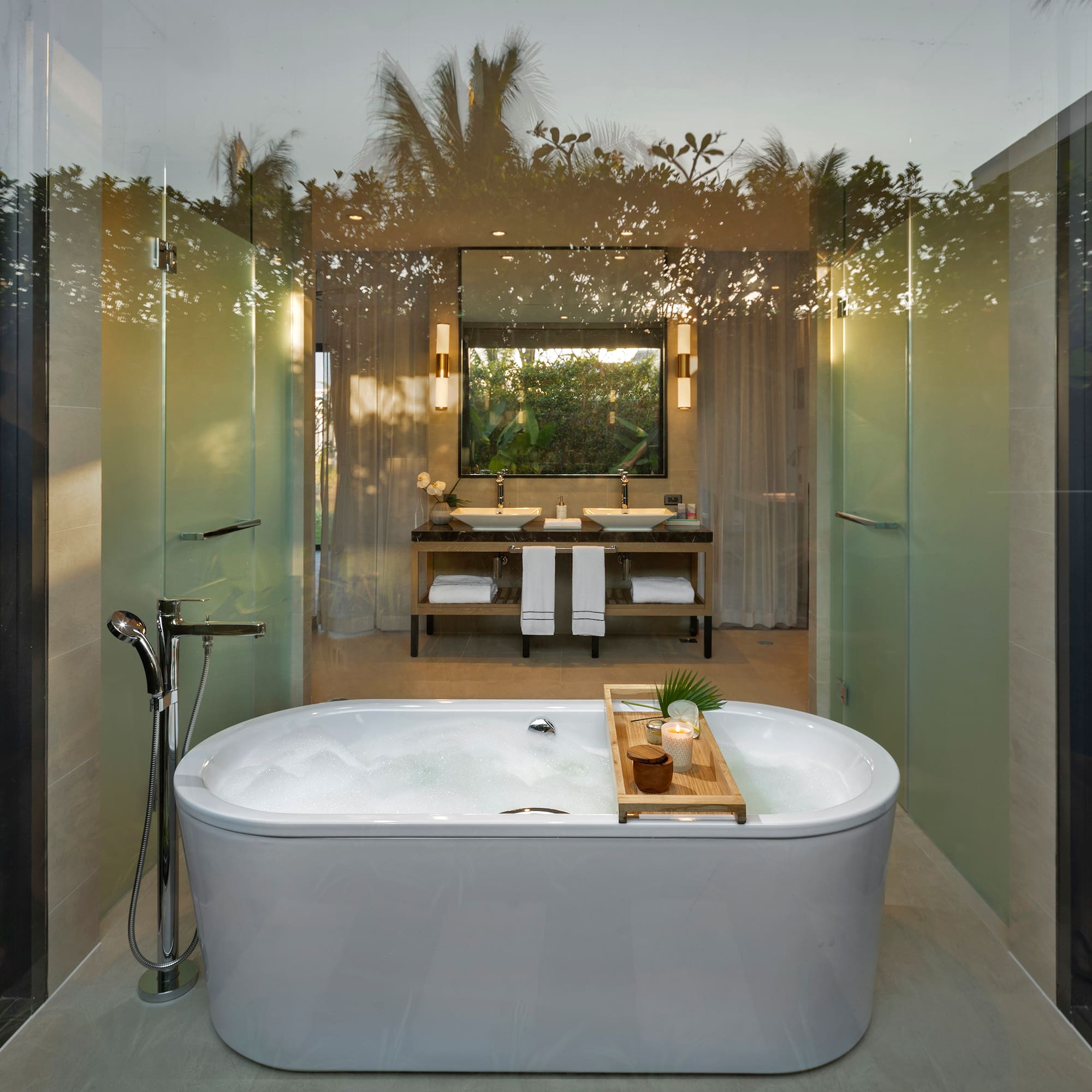 a bathroom with a tub and a mirror