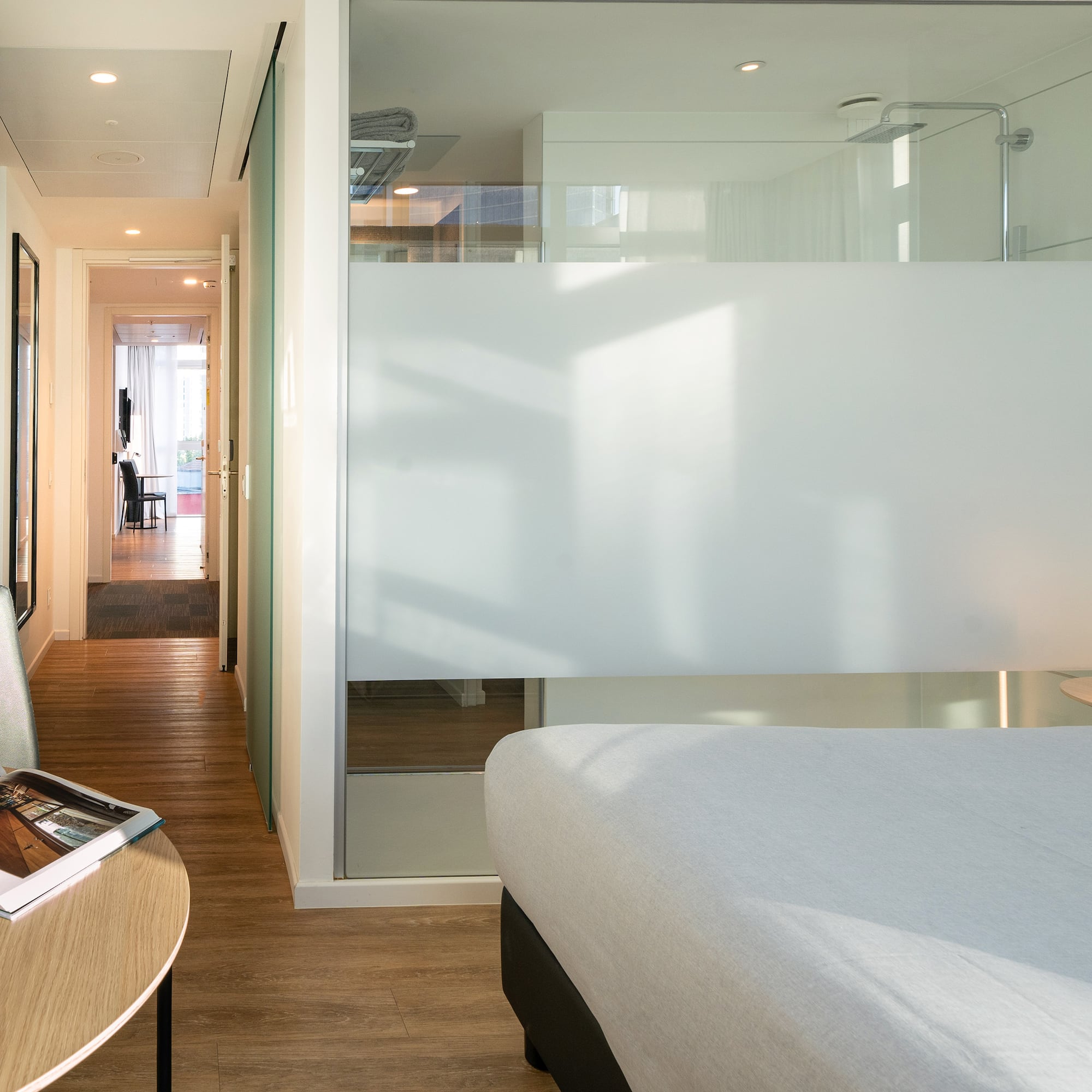 a room with a bed and a desk