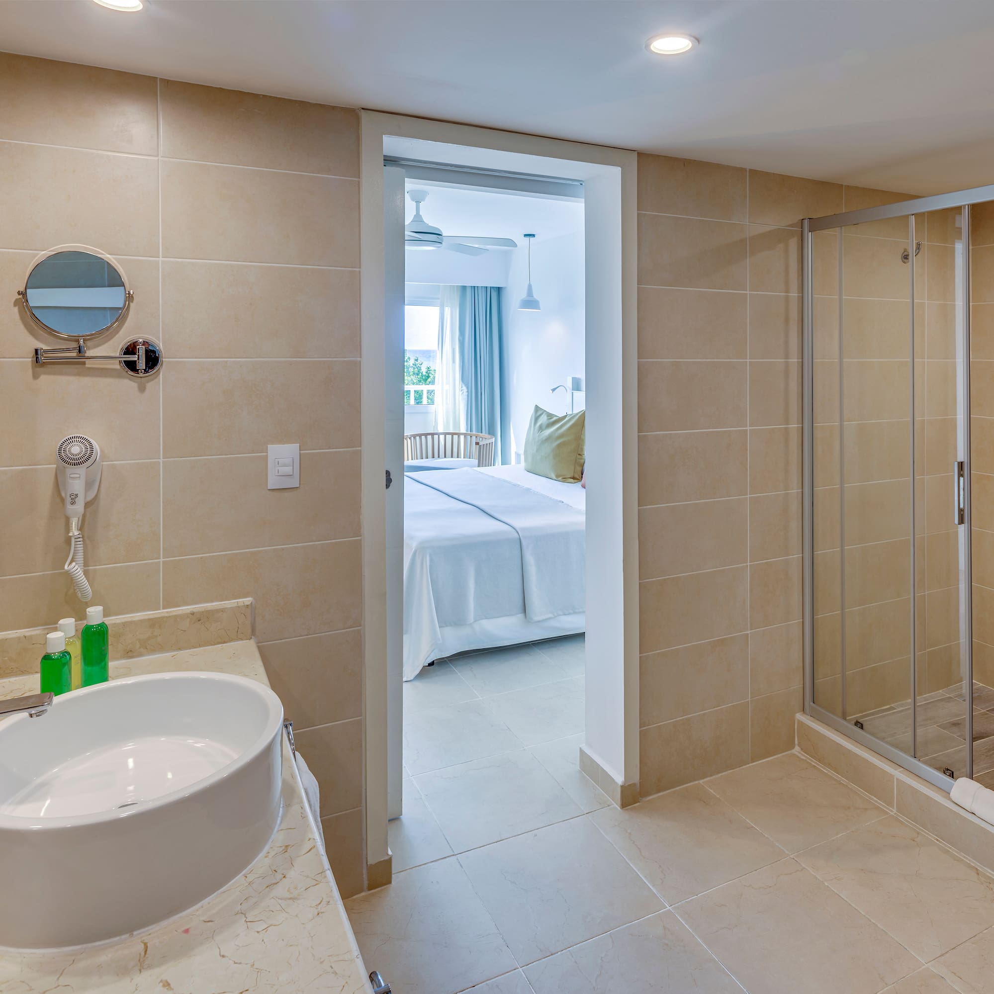 a bathroom with a shower and sink